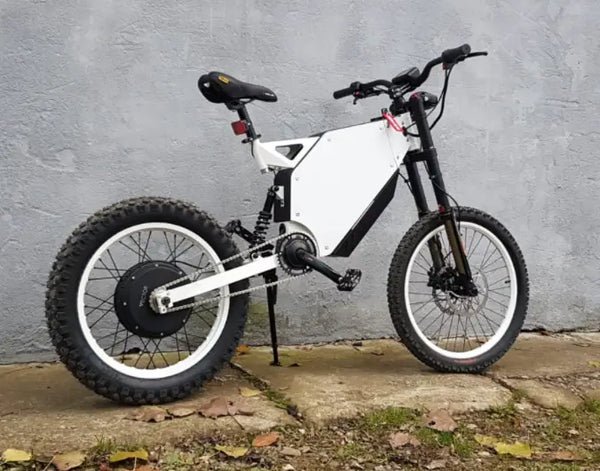 alaria X3 Pro 5kw Electric Bike transitioning from urban street to a light off-road trail in Europe.
